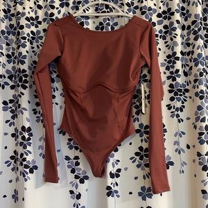 Fabletics Dusty Rose Long Sleeve Talia Thong Bodysuit